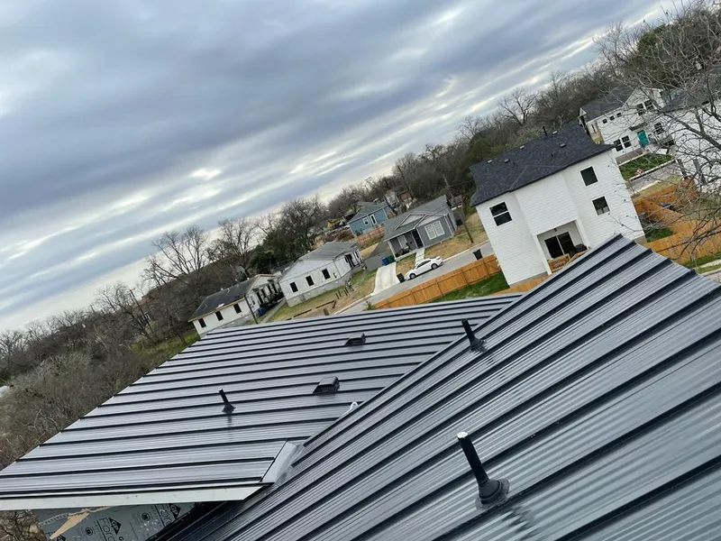 Standing seam metal roof panels with vents for Skylight Repair in Kewanee